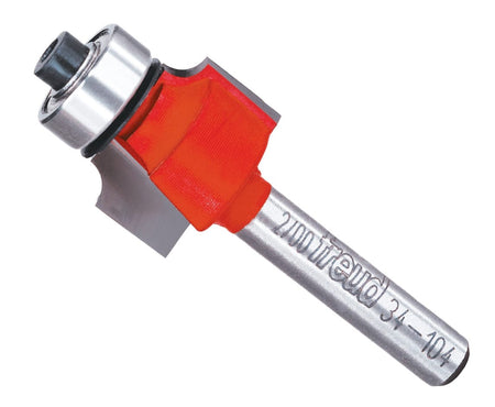 A professional studio product shot of the Freud 34-104 carbide rounding over router bit shown at an angle, featuring the signature red Perma-SHIELD non-stick coating, a ball-bearing guide, and a polished 1/4-inch steel shank.