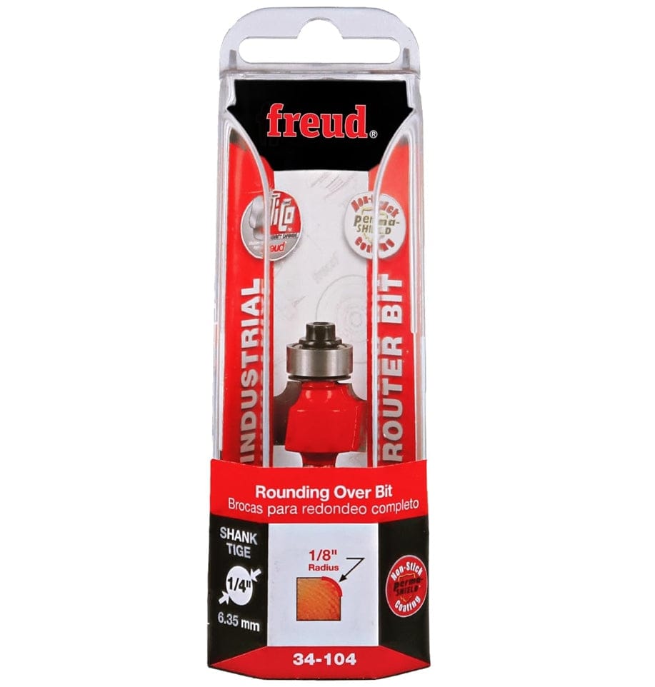 Retail clamshell packaging for the Freud 34-104 industrial rounding over bit, displaying the 1/8-inch radius profile, 3/4-inch overall diameter, and 1/4-inch shank size for professional furniture and molding projects.