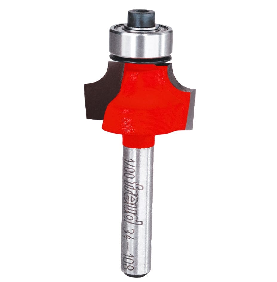 A professional studio shot of the Freud 34-108 3/16-inch radius rounding over router bit, featuring the signature red Perma-SHIELD non-stick coating, a ball-bearing guide, and a polished 1/4-inch steel shank.