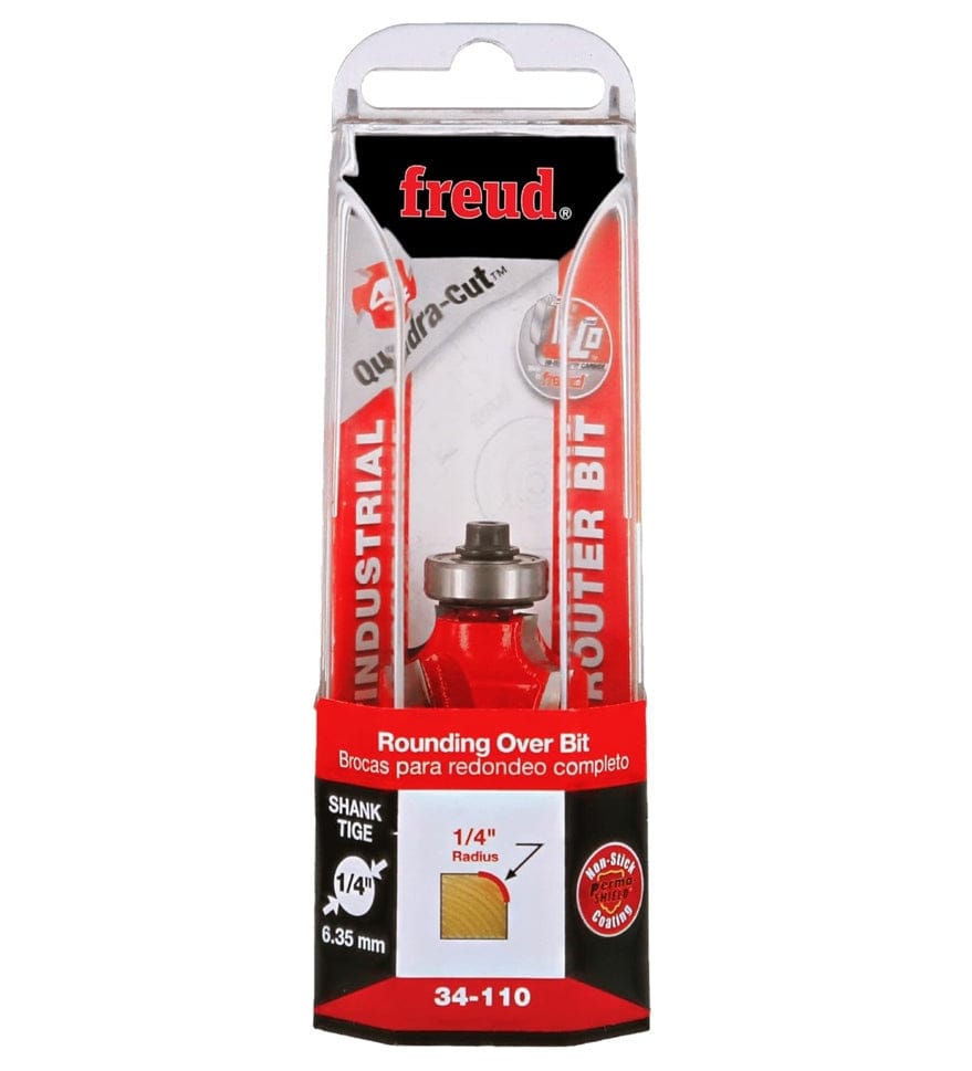 Retail clamshell packaging for the Freud 34-110 industrial rounding over bit, emphasizing the 1/4-inch radius, Quadra-Cut 4-cutter design, and 1/4-inch shank size for professional woodworking.