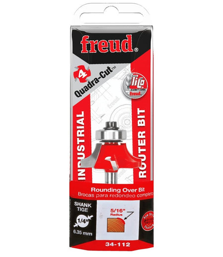Retail clamshell packaging for the Freud 34-112 industrial rounding over bit, emphasizing the 5/16-inch radius, Quadra-Cut 4-cutter design, and 1/4-inch shank size for professional woodworking.