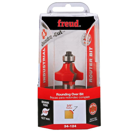 Retail clamshell packaging for the Freud 34-124 industrial rounding over bit, displaying the 3/8-inch radius profile, Quadra-Cut technology logo, and 1/2-inch shank size for professional woodworking and furniture construction.