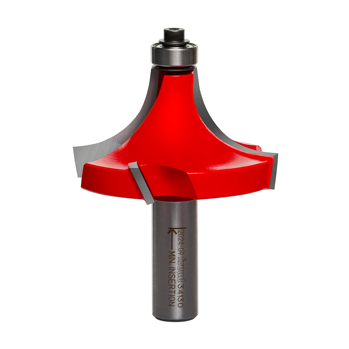 Studio shot of the Freud 34-130 Rounding Over Router Bit featuring a red Perma-SHIELD coated body, a 1/2-inch shank, and a silver ball bearing pilot at the top. The bit showcases the four-cutter Quadra-Cut design.