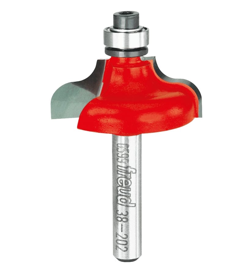 Studio shot of the Freud 38-202 Ogee and Fillet router bit featuring a red Perma-SHIELD body, two carbide cutters, 1/4 inch silver shank, and top ball bearing guide.