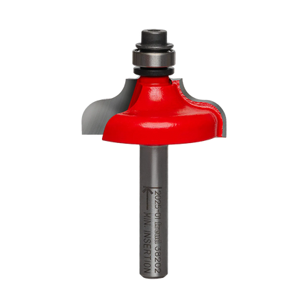 Studio shot of the Freud 38-202 Ogee and Fillet router bit featuring a red Perma-SHIELD body, two carbide cutters, 1/4 inch silver shank, and top ball bearing guide.
