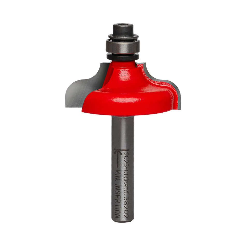 Studio shot of the Freud 38-202 Ogee and Fillet router bit featuring a red Perma-SHIELD body, two carbide cutters, 1/4 inch silver shank, and top ball bearing guide.