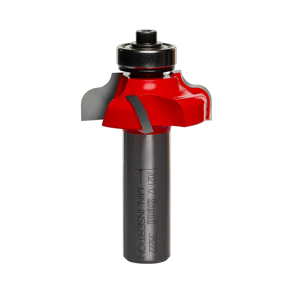 Studio shot of the Freud 38-222 Ogee Fillet router bit featuring a red Perma-SHIELD body, four Quadra-Cut carbide cutters, 1/2 inch silver shank, and top ball bearing guide.