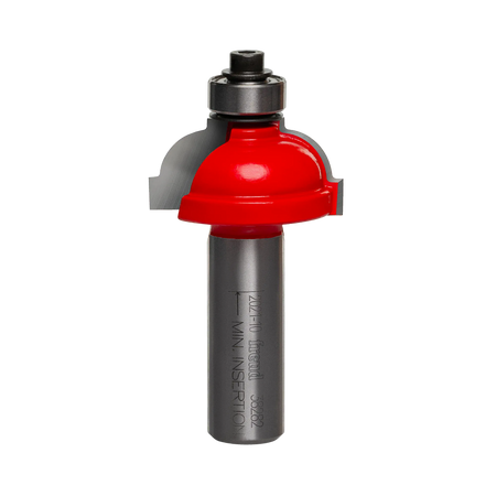 Studio shot of the Freud 38-282 Cove and Fillet router bit featuring a red Perma-SHIELD body, two carbide cutters, 1/2 inch silver shank, and top ball bearing guide.