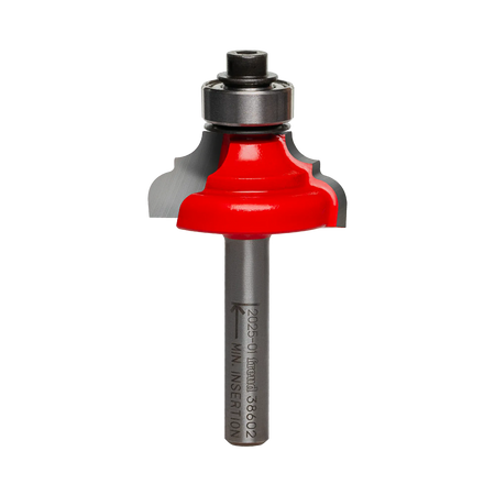 A professional studio photograph of the Freud 38-602 classical cove and round router bit, featuring its signature red Perma-SHIELD coating on the cutting head, silver Quadra-Cut carbide edges, a top-mounted ball bearing pilot, and a polished 1/4 inch steel shank.