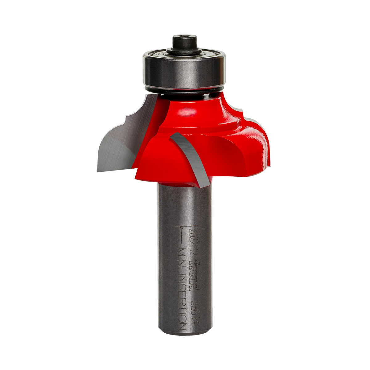 A professional studio photograph of the Freud 38-614 classical cove and round router bit, featuring its signature red Perma-SHIELD coating on the cutting head, silver Quadra-Cut carbide edges, a top-mounted ball bearing pilot, and a polished 1/2 inch steel shank.