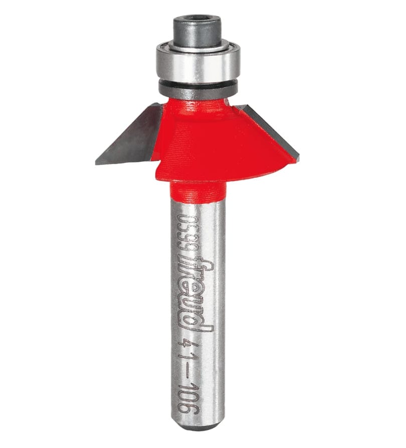 Studio shot of the Freud 41-106 Bevel Trim router bit featuring a red Perma-SHIELD body, angled carbide cutters, 1/4 inch silver shank, and top ball bearing guide.