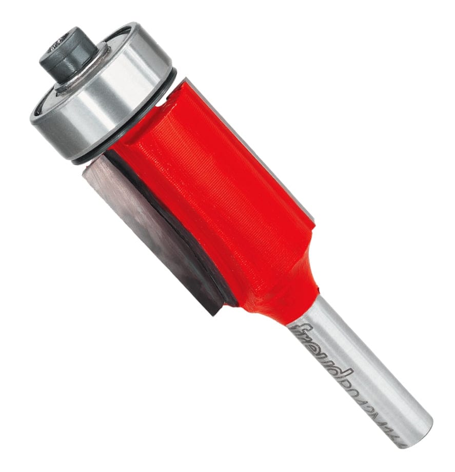 A studio product photograph of the Freud 42-080 flush trimming router bit featuring a red Perma-SHIELD coated body, two silver carbide cutting flutes, a top-mounted ball bearing pilot, and a 1/4 inch shank.
