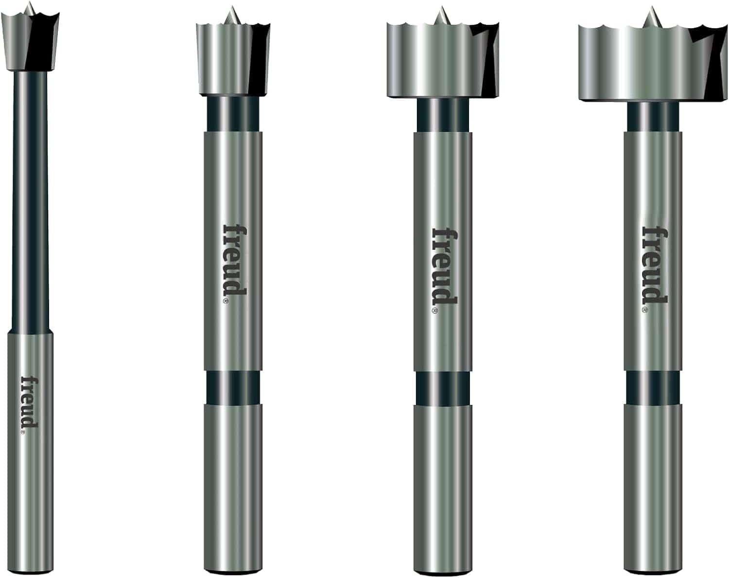 A professional product illustration of the four carbide Forstner bits included in the Freud PB-104 set, showing the progression of sizes with high-quality forged steel shanks and precision shear serrated edges.
