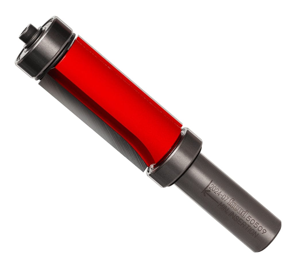 Angled product view of the Freud 50-509 top and bottom bearing flush trim router bit featuring red Perma-SHIELD coating and dual ball bearing pilots for precise template woodworking.
