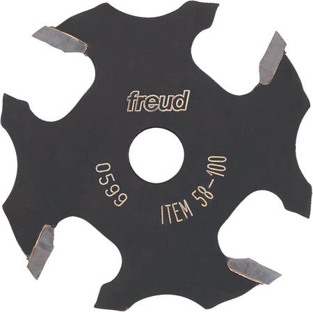 A studio product shot of the Freud 58-100 4-wing slotting cutter, featuring a black-coated body with four silver carbide cutting tips and a center bore for arbor mounting.