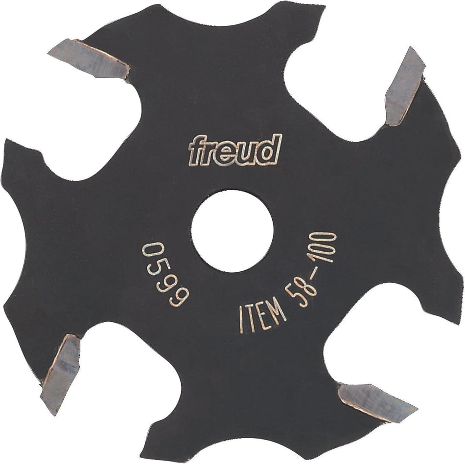 A studio product shot of the Freud 58-100 4-wing slotting cutter, featuring a black-coated body with four silver carbide cutting tips and a center bore for arbor mounting.