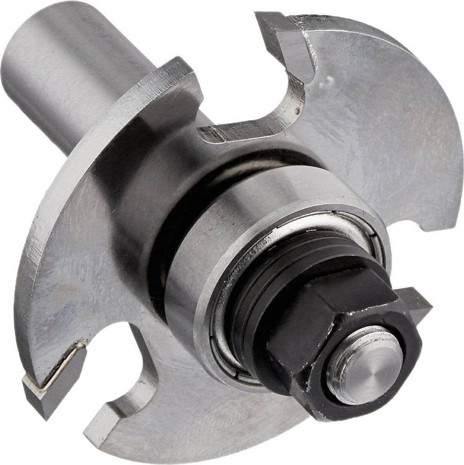 A close-up, angled studio shot of the Freud 63-159 3-wing carbide-tipped slotting cutter, showing the precision-ground cutting edges, the integrated ball bearing, and the 1/2 inch mounting shank arbor.