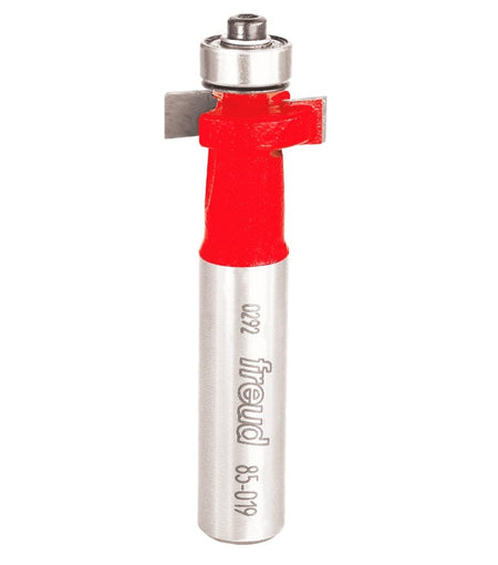 Studio shot of the Freud 85-019 solid surface inlay router bit standing upright, featuring a red body, carbide cutters, and a top-mounted ball bearing guide on a 1/2 inch shank.