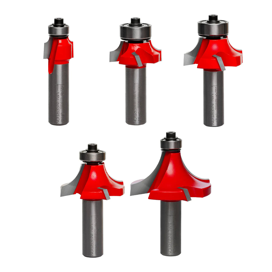 A crisp studio product layout of the Freud 89-152 5-Piece Round Over and Beading Router Bit Set against a white background, displaying five premium red Perma-SHIELD coated bits with micrograin carbide cutting edges and half-inch steel shanks arranged by profiling size.