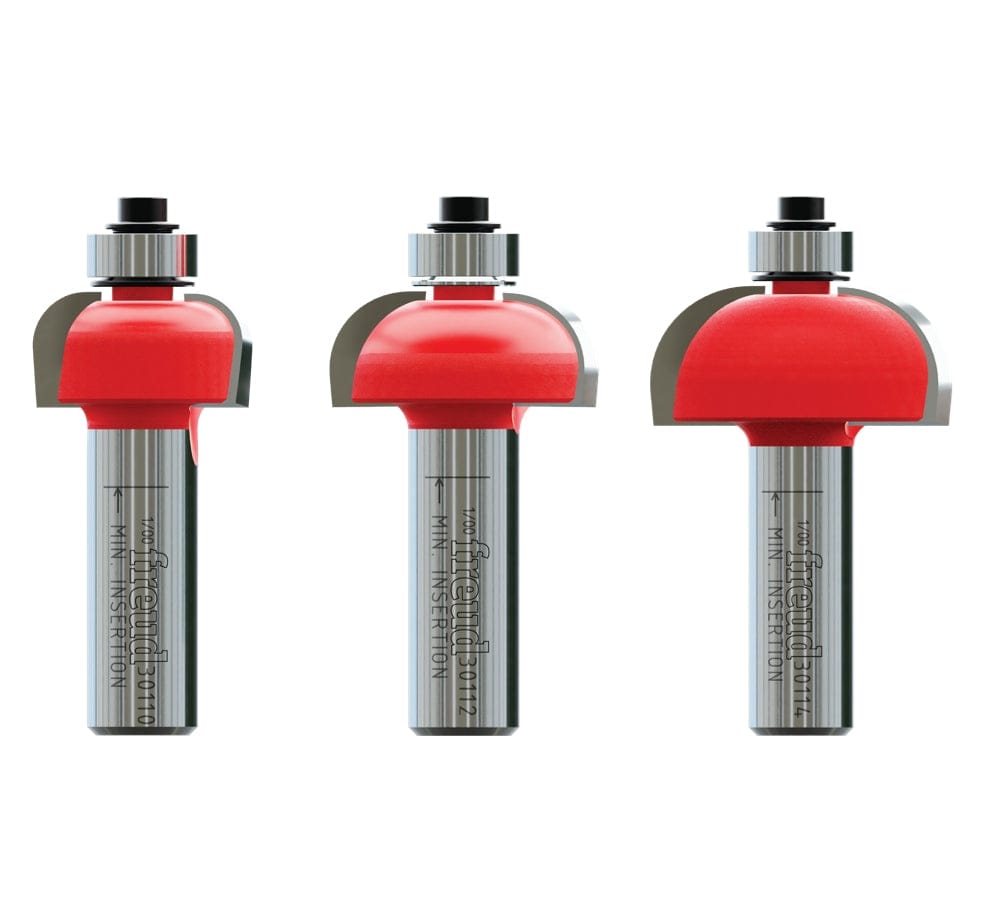 A studio image of the three red Freud cove bits from the 89-550 set, models 30-110, 30-112, and 30-114, lined up in a row.