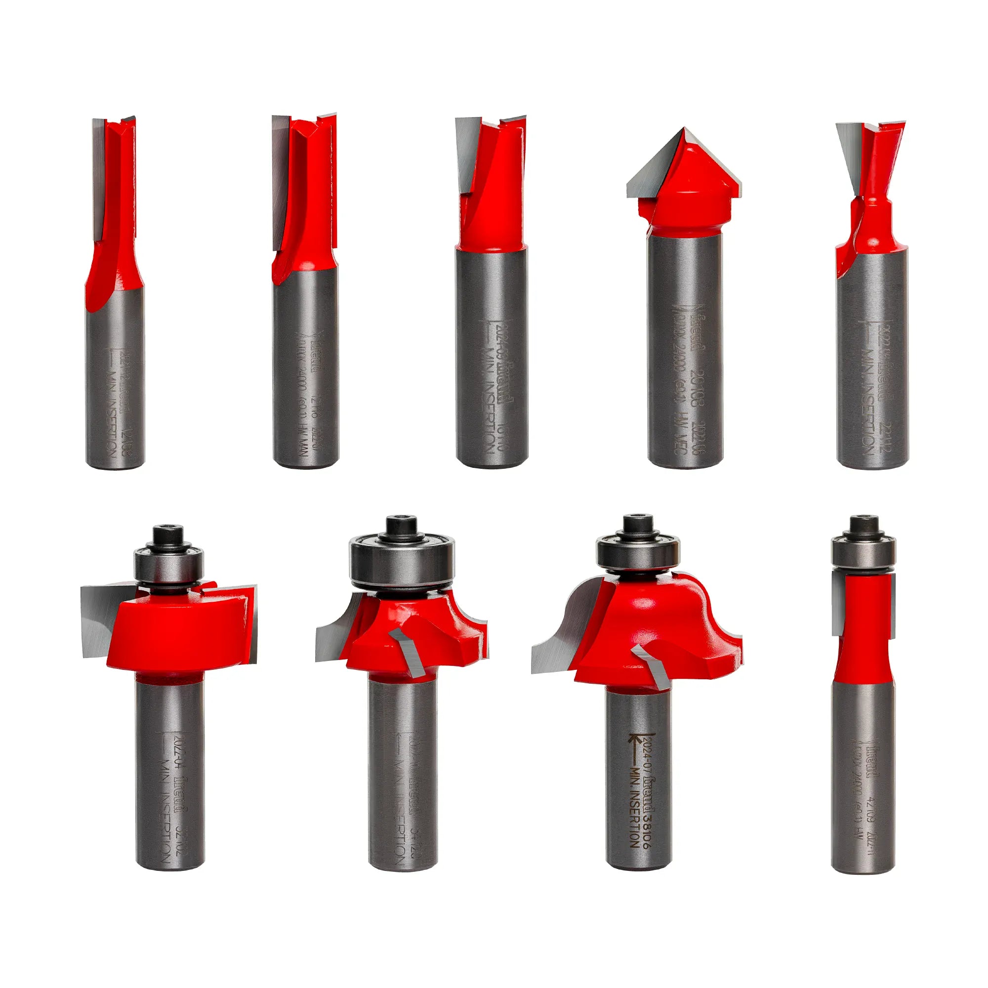 Image of nine Freud router bits arranged in two rows. Each bit has a unique cutting shape, including straight, V-groove, dovetail, rounding over, ogee, rabbeting, and flush trim profiles. Some bits include bearing guides for edge-following precision