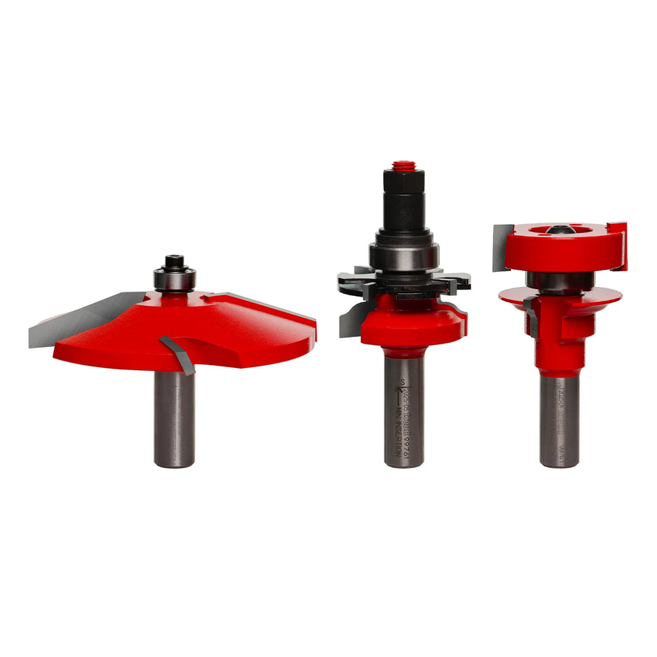 Freud 97-250 3-piece premier adjustable cabinet door router bit set featuring red Perma-SHIELD coating, including an ogee rail and stile bit set and a 3-1/2-inch bevel profile Quadra-Cut raised panel bit.