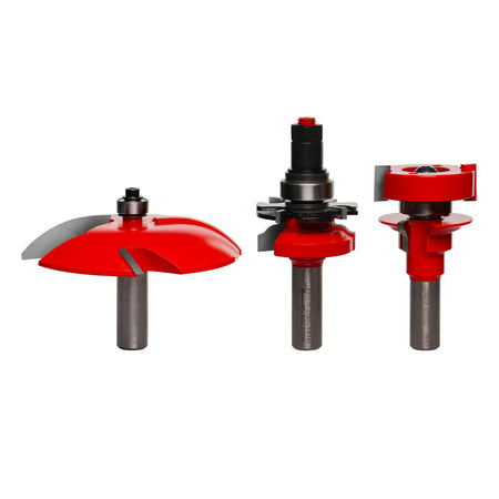 Freud 97-252 3-piece premier adjustable cabinet door router bit set featuring ogee rail and stile bits and a 3-1/2-inch cove profile Quadra-Cut raised panel bit with red Perma-SHIELD coating.