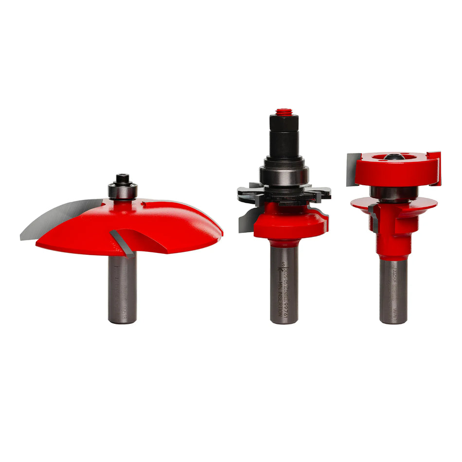 Freud 97-252 3-piece premier adjustable cabinet door router bit set featuring ogee rail and stile bits and a 3-1/2-inch cove profile Quadra-Cut raised panel bit with red Perma-SHIELD coating.
