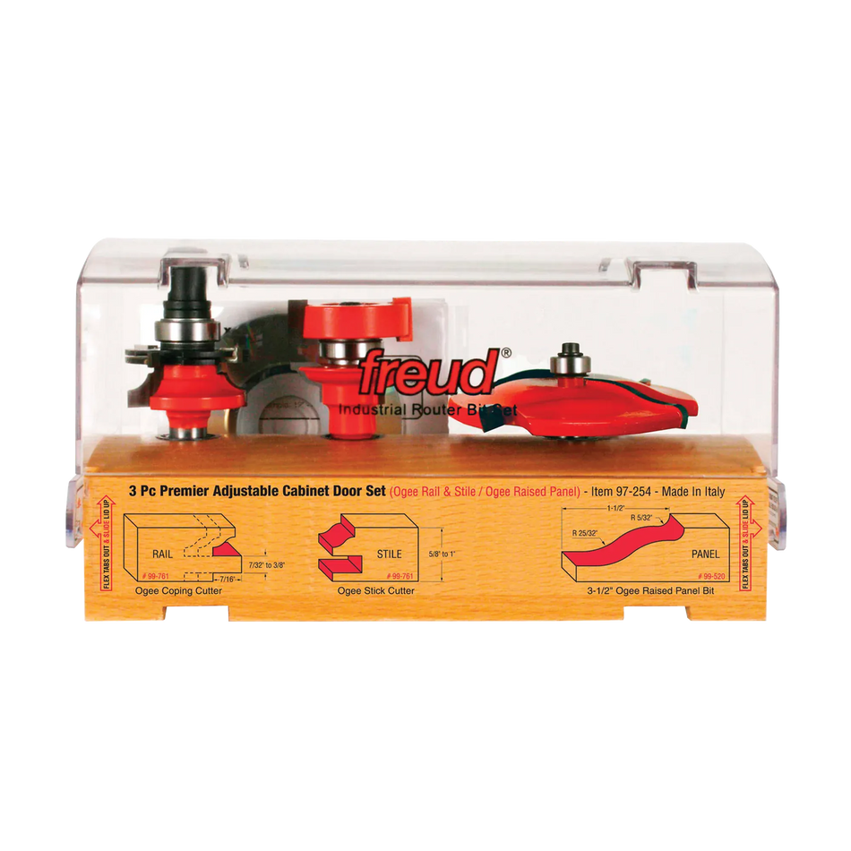 Freud 97-254 3-piece premier adjustable cabinet door router bit set in a wooden storage box featuring ogee rail and stile bits and a 3-1/2-inch ogee raised panel bit.