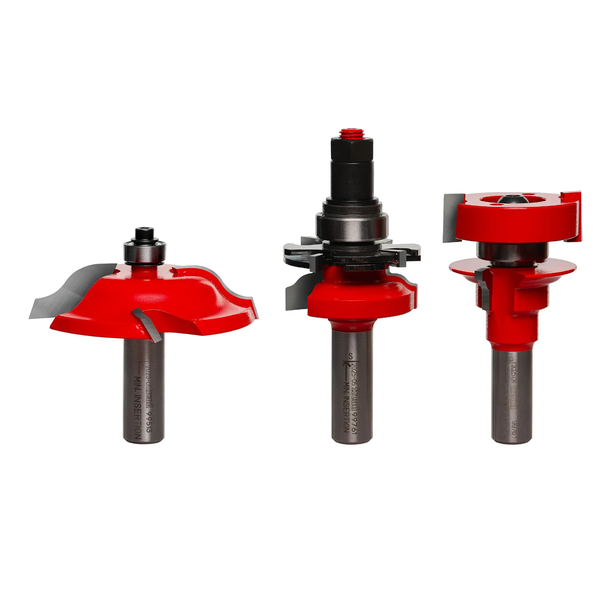 A direct studio product display shot of the Freud 97-276 3-Piece Premier Adjustable Cabinet Door Router Bit Set against a clean white background, showcasing the red Perma-SHIELD non-stick coated bodies, sharp micrograin carbide cutting teeth, and unpainted 1/2-inch steel shanks with laser-etched minimum insertion lines, arranged left to right as the Quadra-Cut ogee raised panel bit with a top guide bearing, the adjustable ogee cope rail bit with shims, and the matching adjustable ogee stick stile bit.