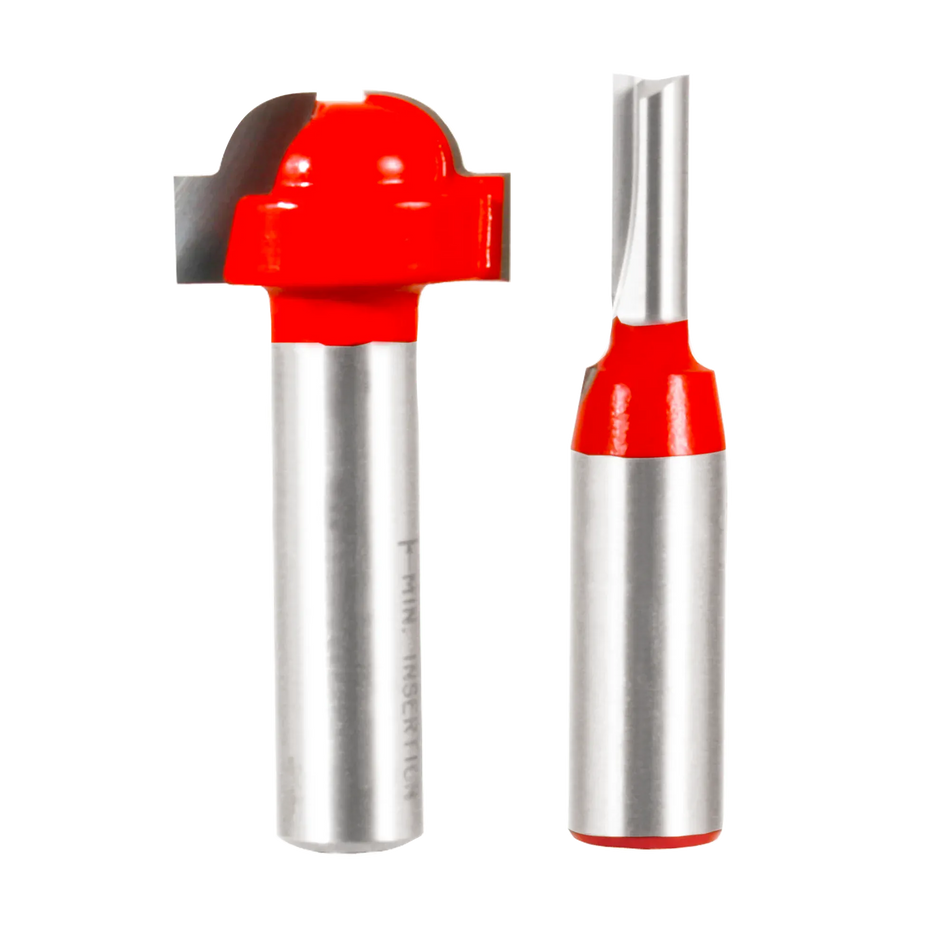 Studio shot of the Freud 98-327 2-piece router bit set against a white background. The set includes two red Perma-SHIELD coated bits with 1/2-inch silver shanks: on the left is a "unique intersection" bit with a profiled cutter head, and on the right is a straight bit, both designed for creating simulated divided lite French door grills.