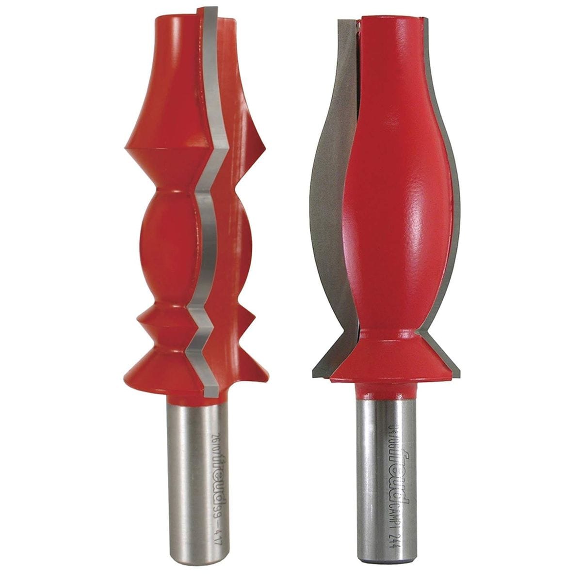 This image displays two large, red router bits with silver cutting edges, designed for shaping wood. They feature ornate, symmetrical profiles, suggesting their use for creating decorative molding or trim.