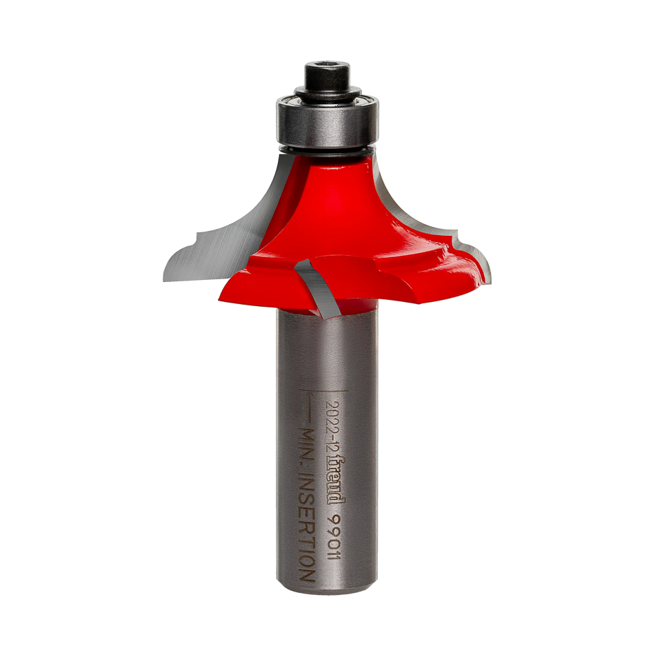 A professional-grade Freud 99-011 1-5/8 inch table top edge classical bold router bit featuring a red Perma-SHIELD coating, a 1/2 inch shank, and a top-mounted ball bearing guide for precision woodworking.