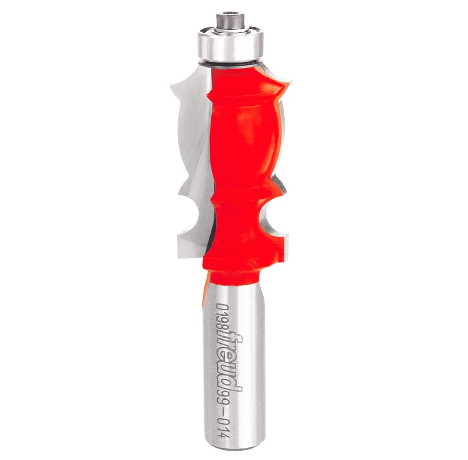 Studio shot of the Freud 99-014 face molding router bit standing upright, featuring a red Perma-SHIELD body, carbide cutters, and a top-mounted ball bearing guide on a 1/2 inch shank.