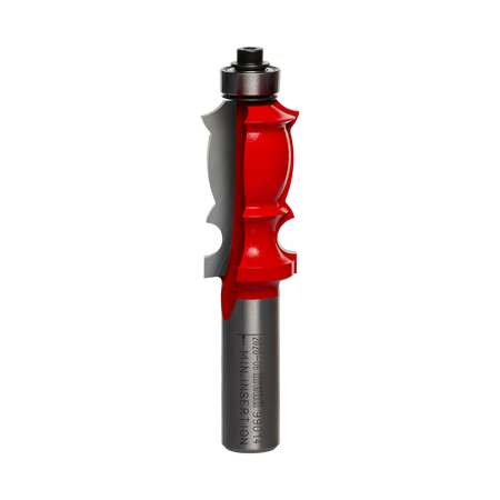 Studio shot of the Freud 99-014 face molding router bit standing upright, featuring a red Perma-SHIELD body, carbide cutters, and a top-mounted ball bearing guide on a 1/2 inch shank.