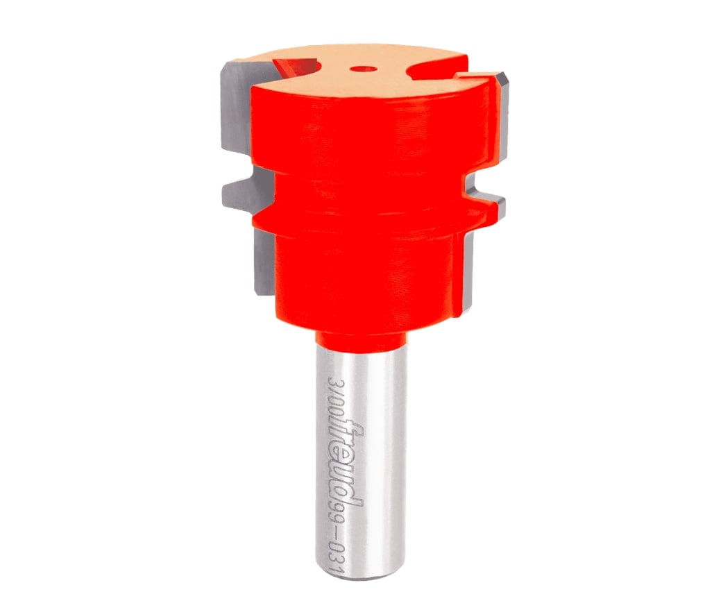 A professional studio shot of the Freud 99-031 1-1/2 inch reversible glue joint router bit, featuring the signature red Perma-SHIELD non-stick coating and a polished 1/2 inch steel shank.