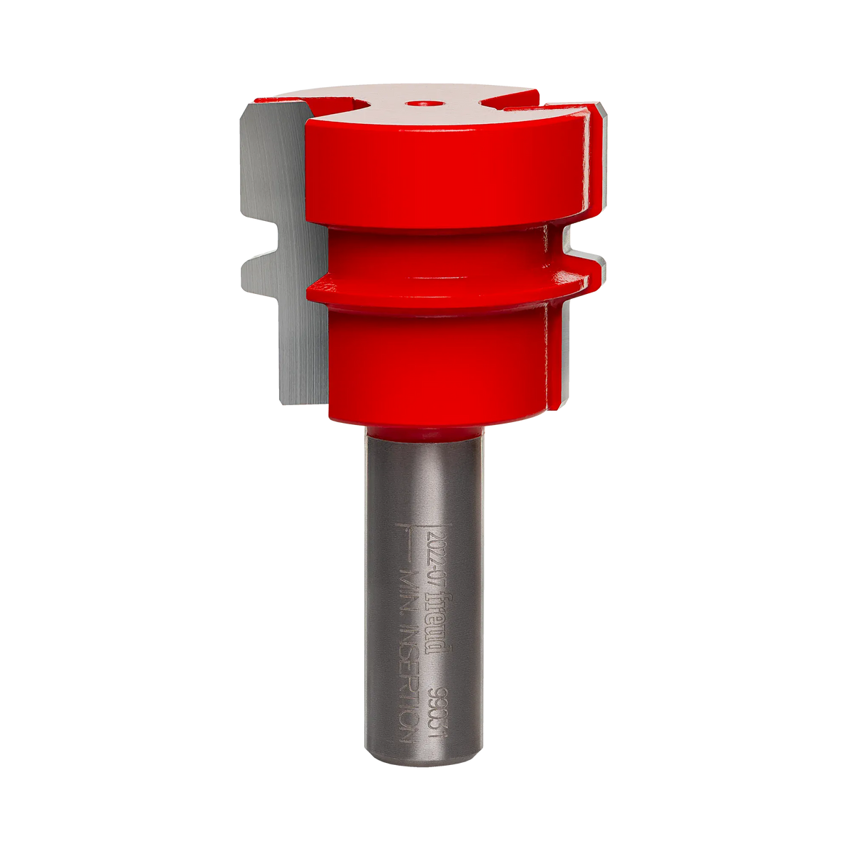 A professional studio shot of the Freud 99-031 1-1/2 inch reversible glue joint router bit, featuring the signature red Perma-SHIELD non-stick coating and a polished 1/2 inch steel shank.