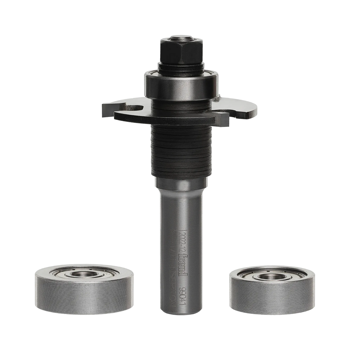 Studio shot of the Freud 99-041 biscuit joining router bit assembly standing upright, featuring a 1/2 inch shank, arbor, and carbide slot cutter, displayed alongside two additional interchangeable silver bearings.