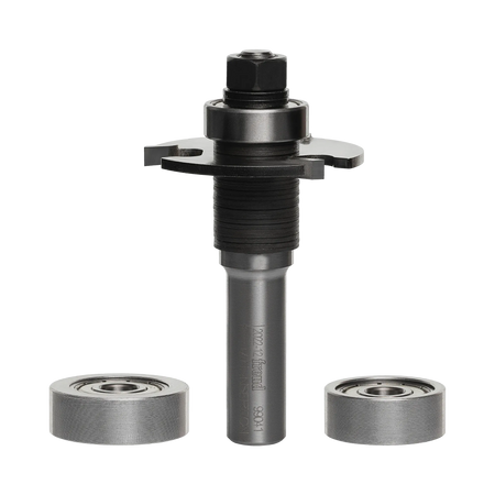 Studio shot of the Freud 99-041 biscuit joining router bit assembly standing upright, featuring a 1/2 inch shank, arbor, and carbide slot cutter, displayed alongside two additional interchangeable silver bearings.