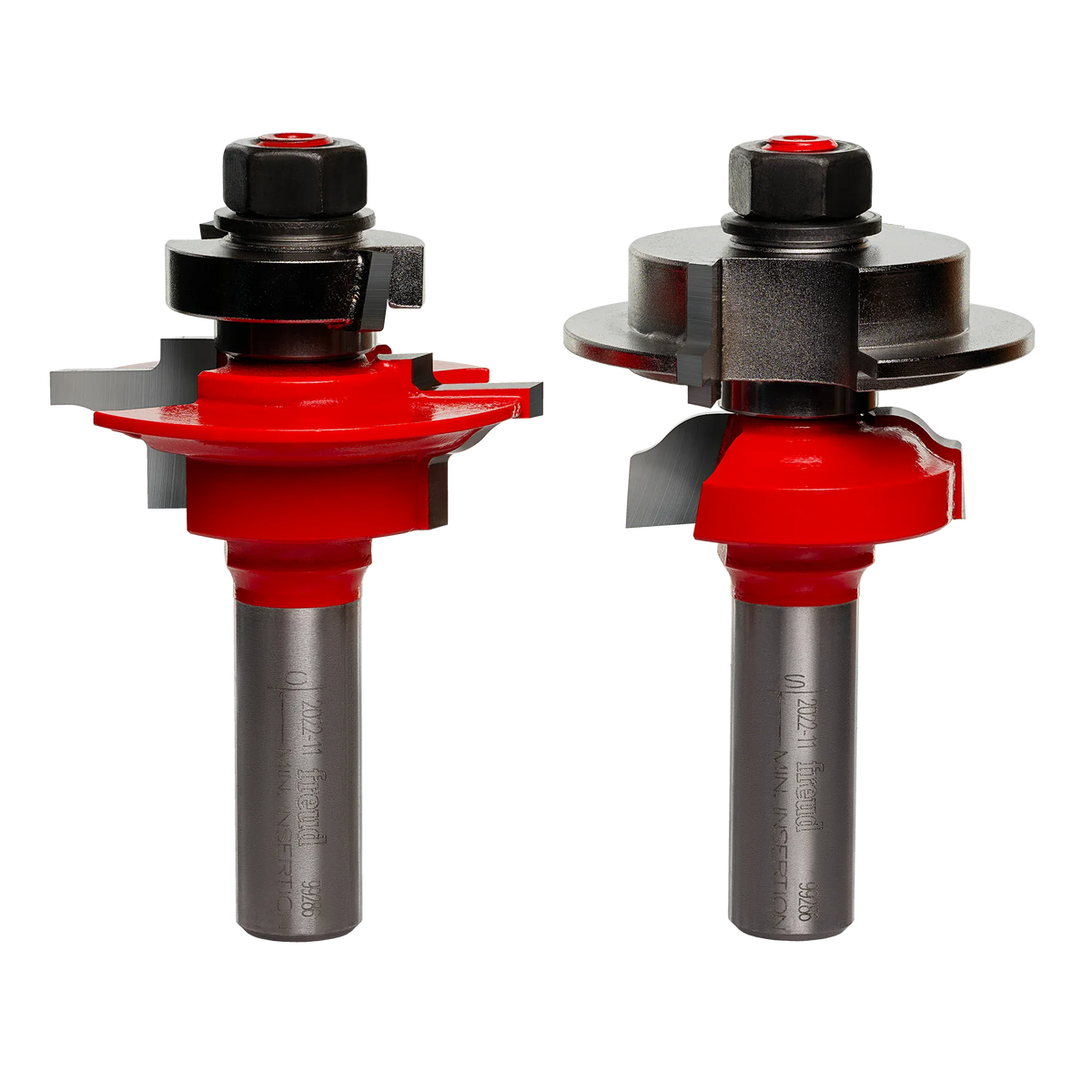 Studio shot of the two-piece Freud 99-286 router bit set standing upright, showing the red Perma-SHIELD bodies and matched cutter profiles.