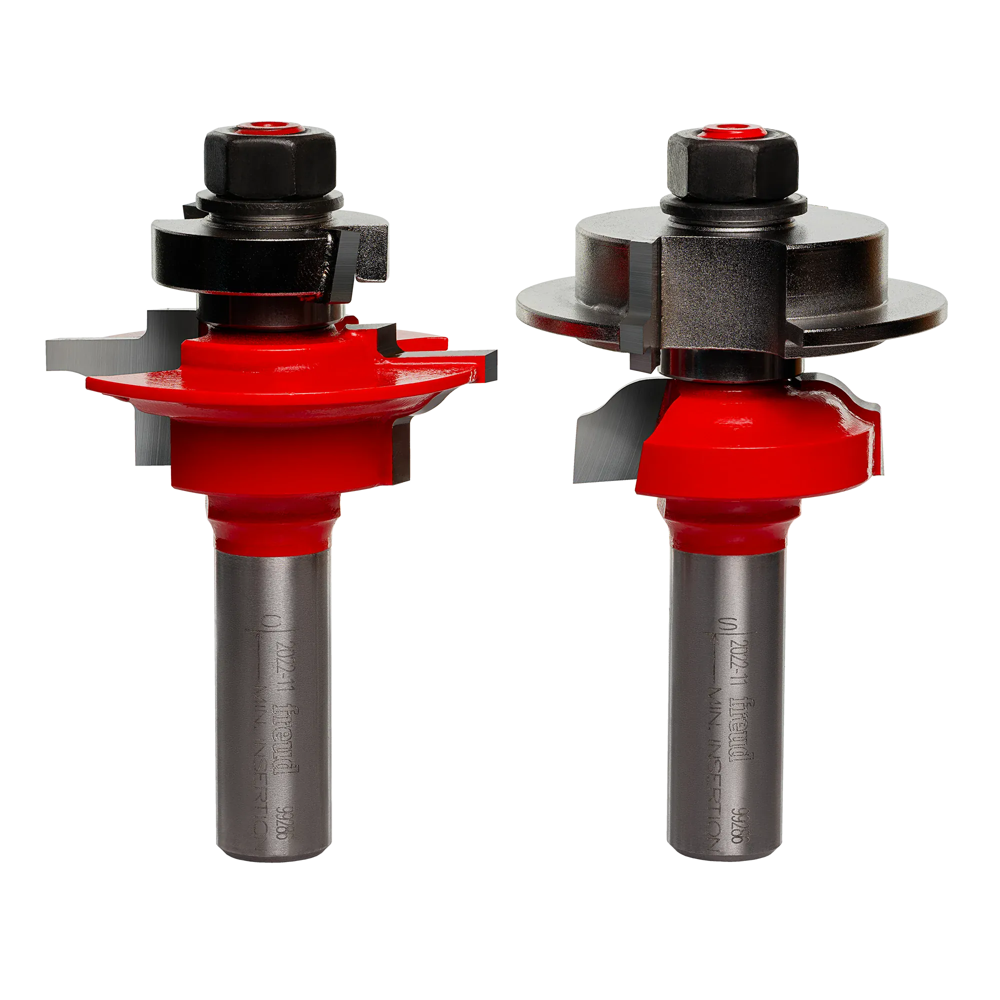 Studio shot of the two-piece Freud 99-286 router bit set standing upright, showing the red Perma-SHIELD bodies and matched cutter profiles.