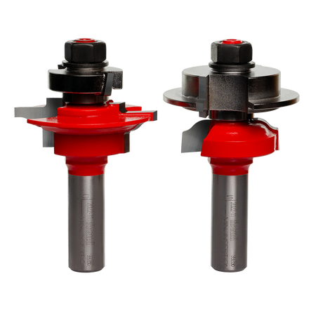 Studio shot of the two-piece Freud 99-286 router bit set standing upright, showing the red Perma-SHIELD bodies and matched cutter profiles.