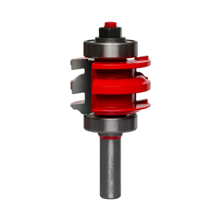 Studio shot of the Freud 99-291 one-piece rail and stile router bit standing upright, featuring a red Perma-SHIELD body with stacked carbide cutters and ball bearing guides on a 1/2 inch shank.