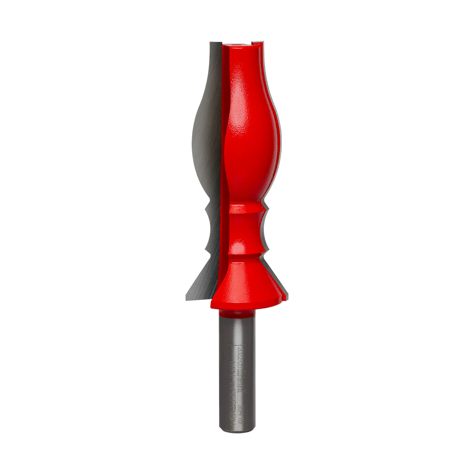 Studio shot of the Freud 99-416 wide crown molding router bit standing upright, featuring a tall red Perma-SHIELD body with carbide cutters on a 1/2 inch shank.