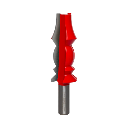 Studio shot of the Freud 99-417 wide crown molding router bit standing upright, featuring a tall red Perma-SHIELD body with carbide cutters on a 1/2 inch shank.