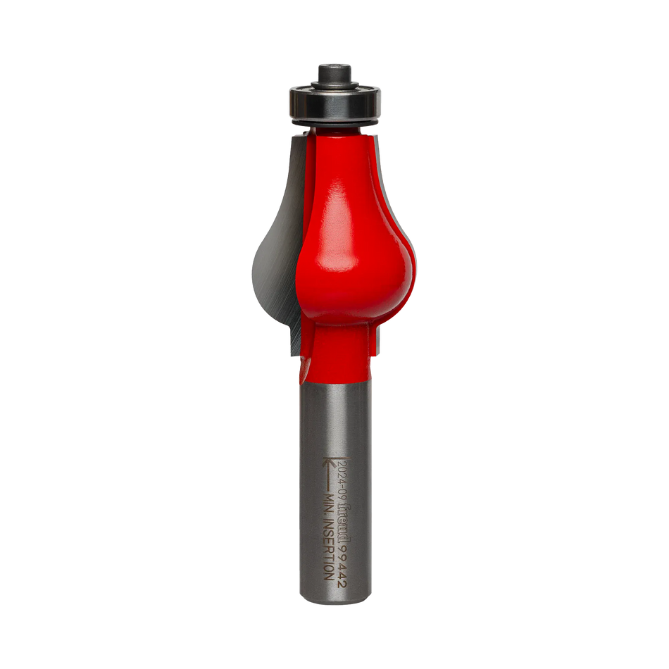 Studio shot of the Freud 99-442 handrail router bit standing upright, featuring a red Perma-SHIELD coating, carbide cutters, and a ball bearing guide on a 1/2 inch shank.