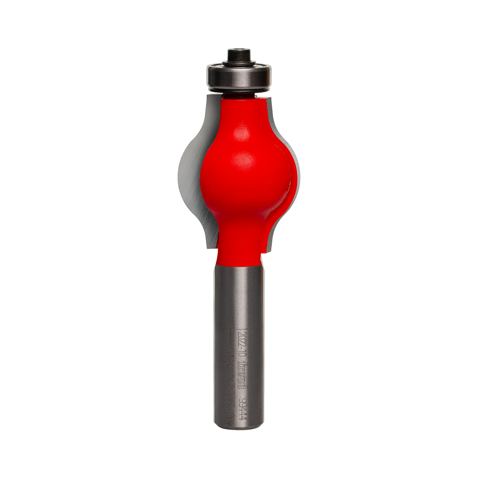 Studio shot of the Freud 99-444 handrail router bit standing upright, featuring a red Perma-SHIELD coating, carbide cutters, and a ball bearing guide on a 1/2 inch shank.
