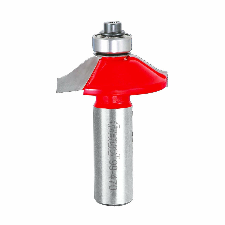 A detailed image of the Freud 99-470 reversible wainscoting router bit, featuring its distinctive red Perma-SHIELD coating on the cutter head and the Freud logo on the 1/2 inch silver shank.