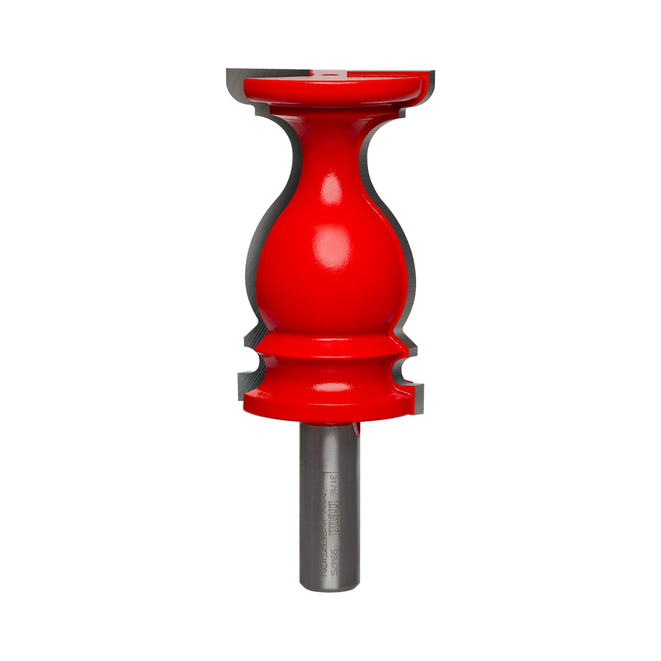 Studio product shot of the Freud 99-475 Chair Rail Router Bit. The bit features a large, complex red Perma-SHIELD coated body designed to mill architectural molding, mounted on a 1/2-inch silver shank.
