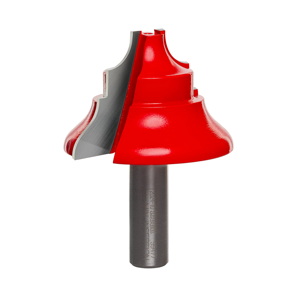 Studio shot of the Freud 99-477 chair rail router bit with red Perma-SHIELD coating, highlighting the complex upper profile cutter geometry and 1/2 inch shank.